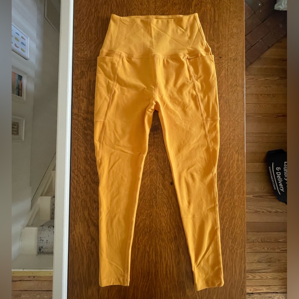 Beyond Yoga “Out-of-Pocket”High Waisted Performance Leggings in Orange